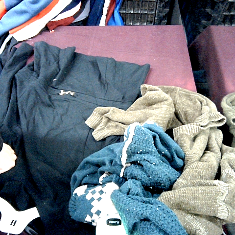Mixed Pile of Clothing