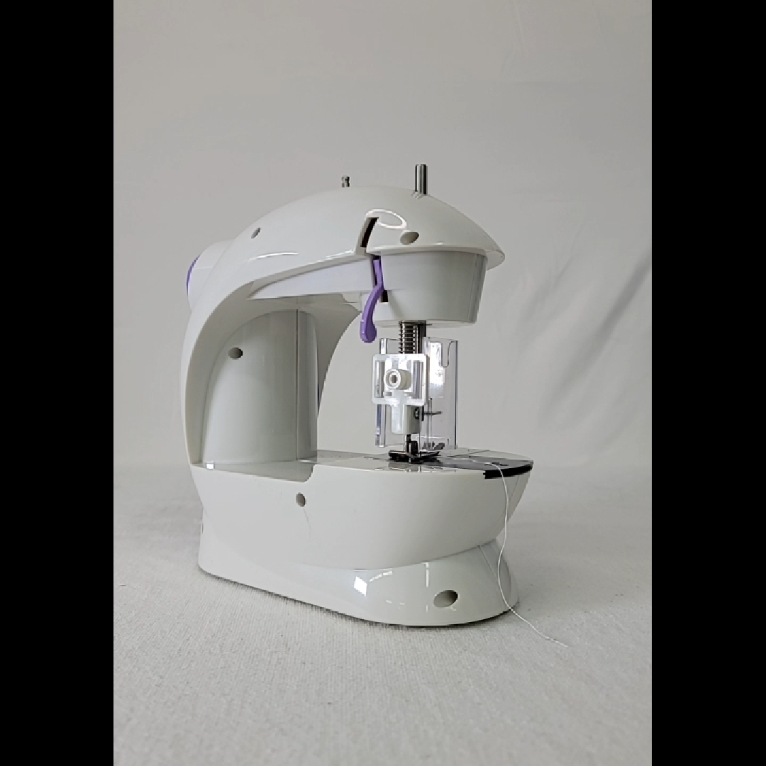 Compact White and Purple Sewing Machine