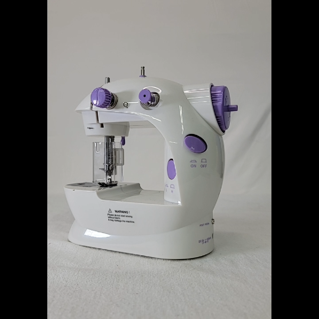 Compact White and Purple Sewing Machine