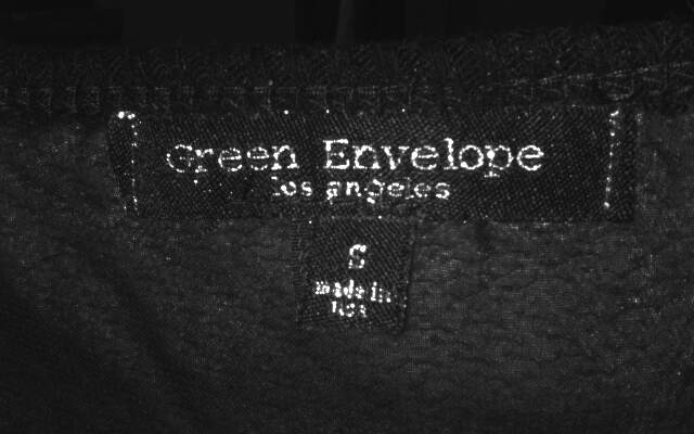 Stylish Black and White Sweater by Green Envelope