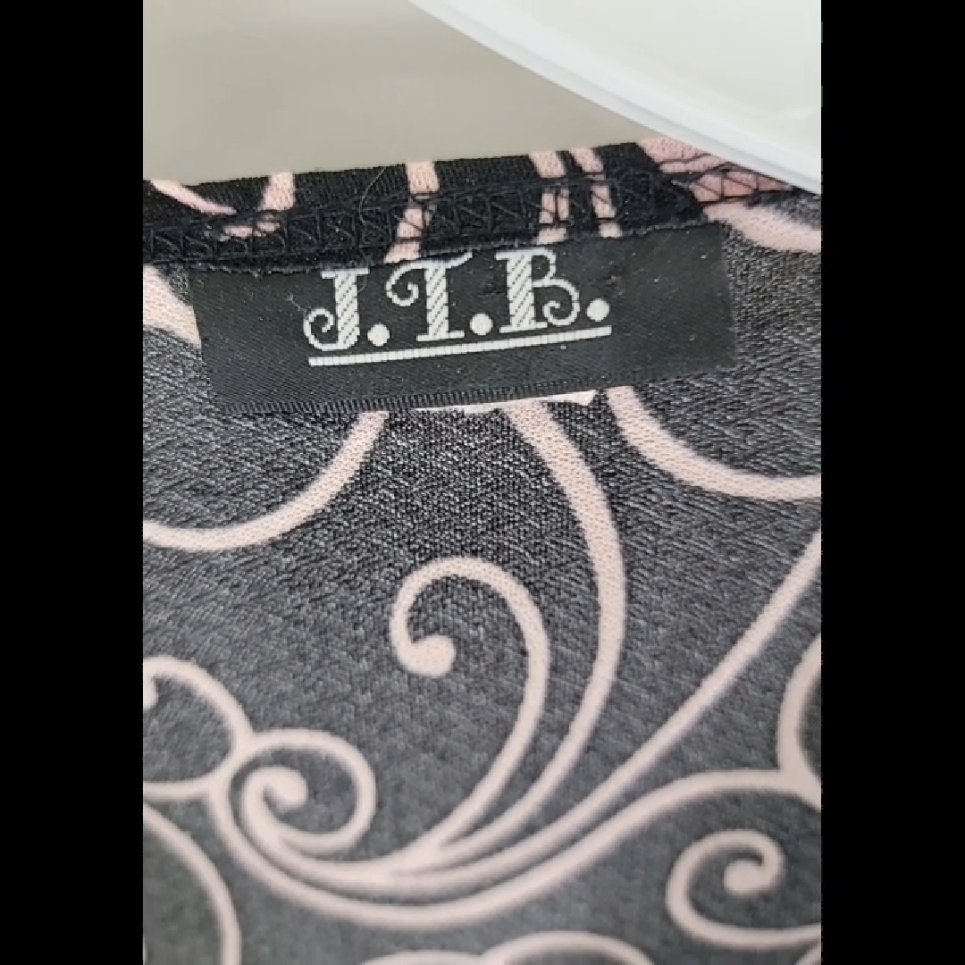 Elegant Black and White Swirl Blouse Size PS